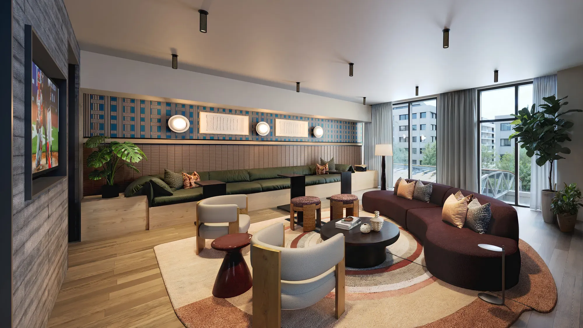 Spacious modern lounge with a curved sofa, accent chairs, and built-in bench seating.