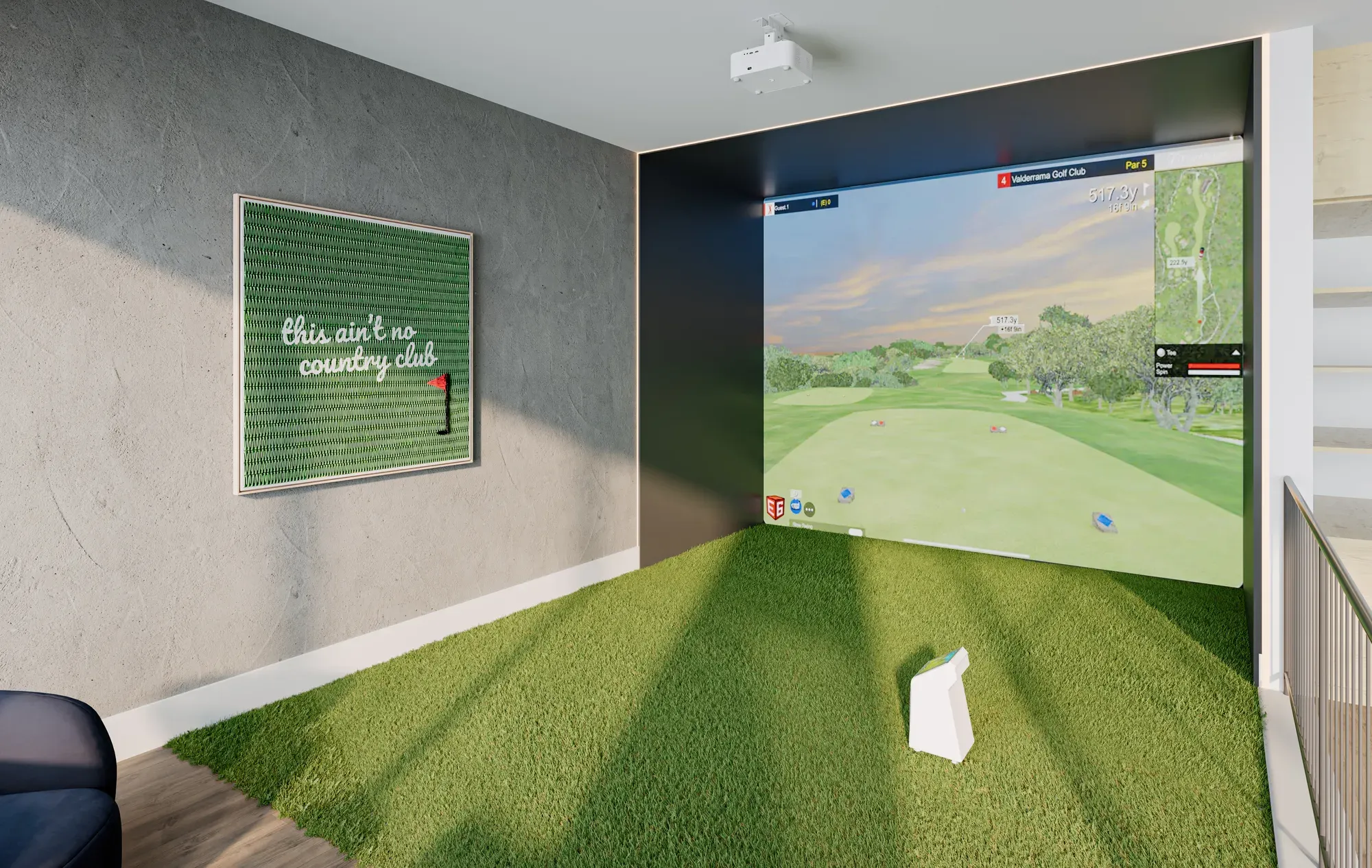 Indoor virtual golf simulator room with a green turf hitting area.